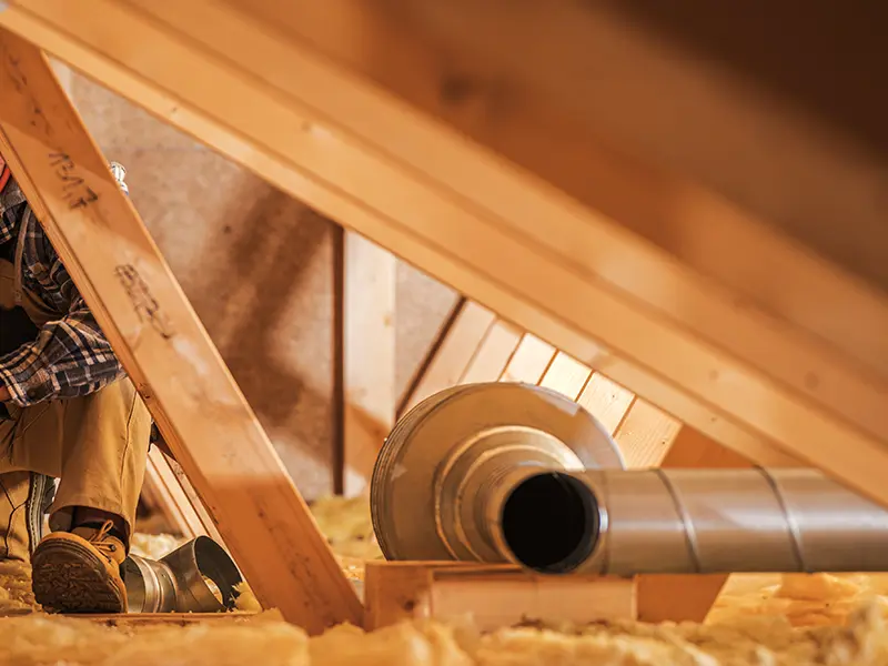 Pose d'une ventilation en passant par les combles